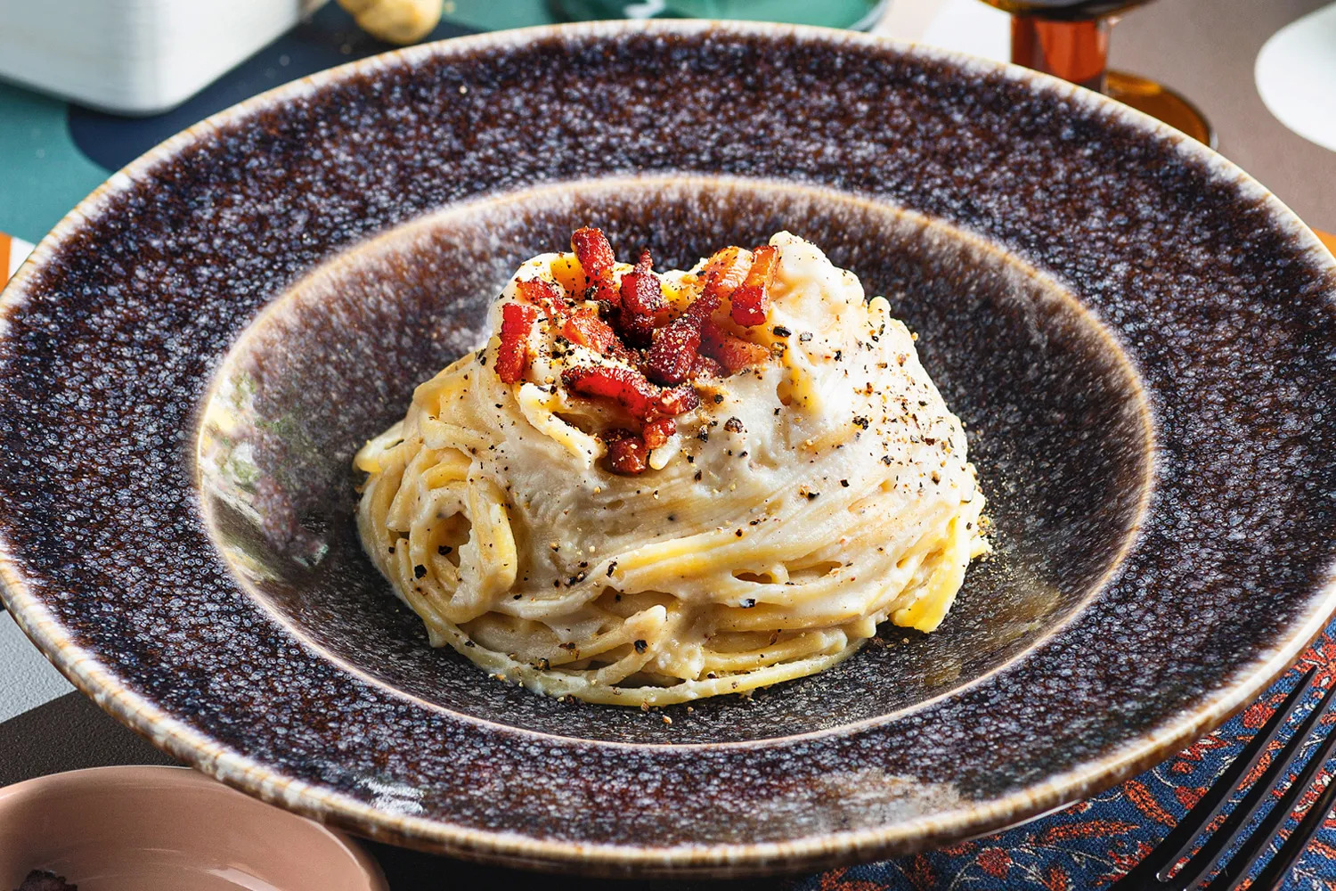 Pasta con crema di cavolfiore e pancetta croccante