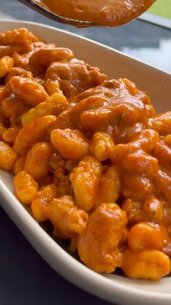 Pasta con crema di fagioli, salsiccia e rosmarino