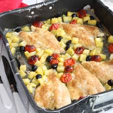 Filetti di orata al forno con patate e pomodorini